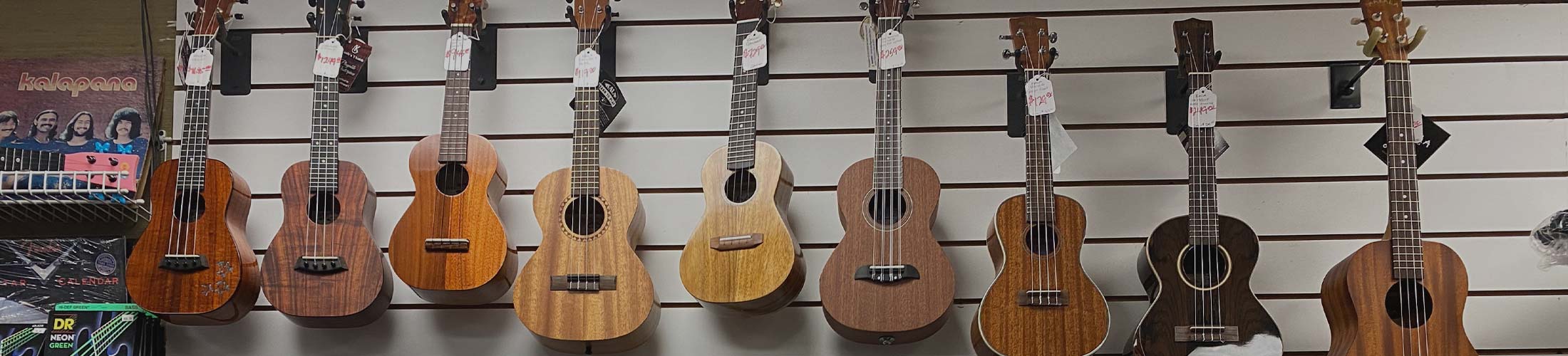 image of ukuleles hanging up at WestSide Music in Waipahu